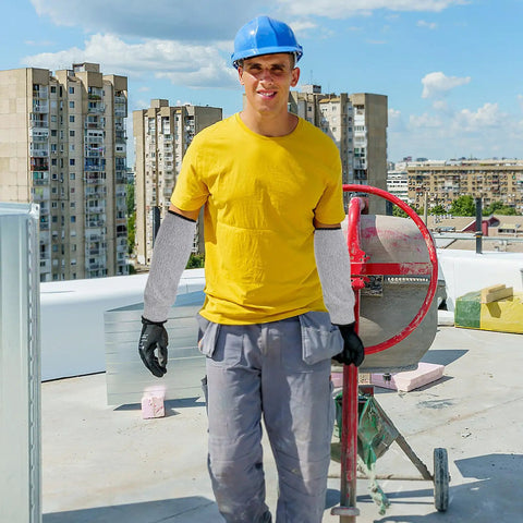 Heavy Duty Cut Resistant Arm Sleeves With Scratch Proof Armor For Gardening And Butchery Tasks Bite Resistant Guards worn by a construction worker.