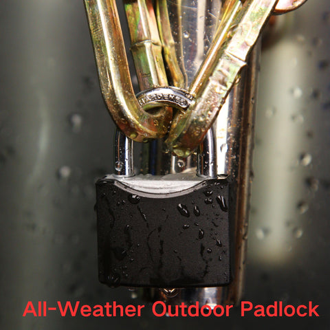 Close-up of All Weather Outdoor Padlock Set Keyed Alike, showing wet black cover on steel lock with brass shackle.