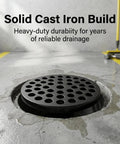 Solid 4.5 Inch Cast Iron Floor Drain Cover Round Heavy Duty Drain Strainer For Bathrooms And Patios Bombproof Grime Guard in installed position.