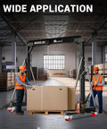 3 Ton Portable Gantry Crane With 8.53 Ft Wide Span And 8.53 To 12.47 Ft Adjustable Height Manual Trolley Lift System For Auto Shops Factories And Garages Heavy Duty Steel Construction Black lifting a large box in a warehouse setting.