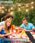 People enjoying outdoor dinner with 200 Ft LED Outdoor String Lights With Remote 74 Plus 2 Shatterproof Bulbs Dimmable Timer And 3 Modes.
