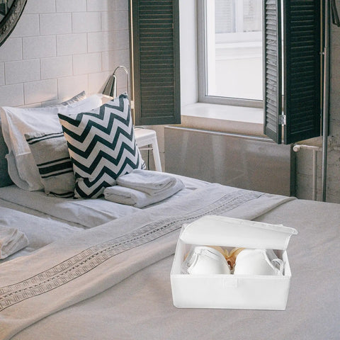 Premium Collapsible Oxford Cloth Drawer Organizer With Lid For Underwear Bras And Bathing Suits on a bed with white linens.