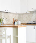 Peel And Stick Backsplash Tiles 10.95 By 9.70 Inches, 3D Adhesive Bezel Beige Marble Look, Pack Of 10 in a modern kitchen setting