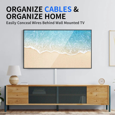 One Cord Cable Hider Kit showing paintable cable raceway under wall mounted TV above wooden console.