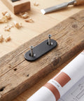 Beefy Stainless Flat Bracket Set With Screws For Wood Repair on a wooden board with tools and plans, size 2.36 by 0.63 inch.
