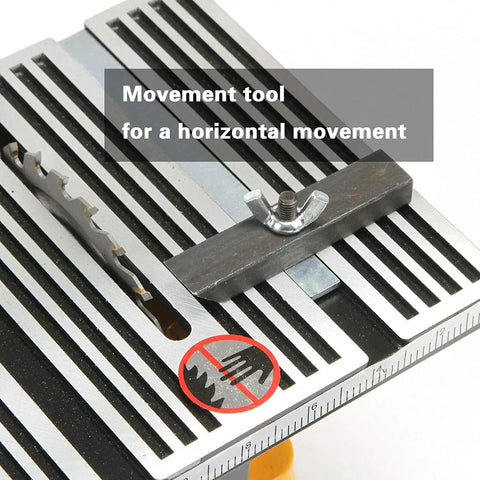4 Inch 60W Mini Electric Table Saw For Bench Top DIY Projects Includes Two Circular Blades showing movement tool