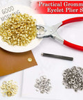 Complete 1200 Piece Pro Grade Grommet Eyelet Kit For Fabric And Leather Projects With Plier Hole Punch And 600 Silver And Gold Eyelets Plus 600 Washers One Quarter Inch Grommets Six Millimeter Set For Belts Clothing And DIY Repairs shown with gold and silver eyelets and red-handled pliers