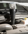 Big Fifteen Point Five Quart Oil Drain Pan With Easy Pour Spout And 18 Inch Mechanics Funnel Kit for auto fluids in use.