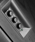 Close-up of EQ controls on R1280T Powered Bookshelf Speakers For Studio Monitoring 2.0 Active Near Field Monitors