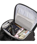 Inside view of Urban Access 13 Side Loading Camera Backpack with compartments, mesh pocket, and packed with personal items and keys.