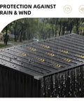 Rain pouring on black waterproof metal outdoor storage shed with chain lid, showcasing weatherproof protection in garden area.