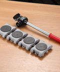 8 Pack ABS Moving Wheel Set For Quick Furniture Relocation Tool Free Assembly Anti Slip Sliders displayed on wooden surface