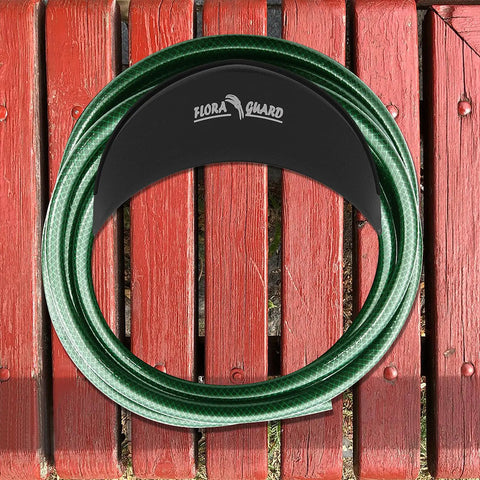 Space Saving Wall Mount Hose Holder Set Heavy Duty Metal Garden Water Hose Hanger That Holds Up To 125 Feet Anti Rust Anti Slip Outdoor Hose Reel Black 2 Pack mounted on red wood