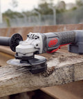 20V Cordless Angle Grinder And Cutoff Tool With 8000 RPM 1 HP 4.5 Inch Wheel Tool Only on wooden beam