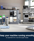 Must Have Essential Coffee Machine Maintenance Kit With BPA Free Water Filter Ion Exchange Tech Activated Carbon Plant Based Descaler For Most Espresso Machines With Filters DLSC306 Black on countertop with De'Longhi machines