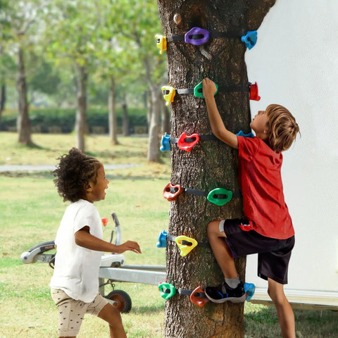 Kids enjoying Ninja Tree Climbing Holds Set For Kids And Grownups, 12 Durable Outdoor Climbing Rocks With 6 Ratchet Straps