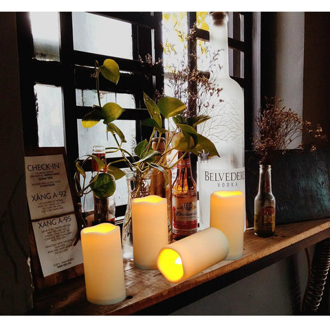 2 Pack Outdoor Flameless LED Pillar Candles With Remote And Timer, Waterproof Battery Operated, on a rustic shelf