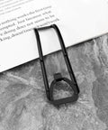 Close-up view of a black frame from 8Pcs Drone Propeller Guards Pro Kit For Z908 Pro Quadcopter 7.7cm, resting on a marble surface.