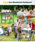 Portable Outdoor Grill Table Cart With Wheels used for a backyard BBQ, showcasing its folding stand and griddle compatibility.