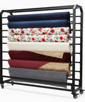 Straight Up Heavy Duty 16 Rods Fabric Roll Storage Rack With Adjustable Hanging Bars, holding colorful fabric rolls.