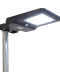 Ridiculously Bright 1600 Lumen Solar Street Light With Motion Sensor Waterproof Dusk To Dawn LED Flood Lamp mounted on pole