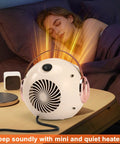 Compact Desk Heater For Office And Home Personal 500W PTC Ceramic Space Heater in white and rose gold on bedside table.