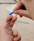 Using 4 Pcs Mini Eyeglass Screwdriver Set 4 In 1 Precision Kit for eyeglass repair, blue handle, close-up shot.