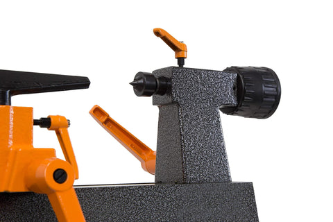 WEN mini benchtop wood lathe with orange levers, black dial knob, and speckled gray base