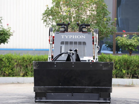 Front view of Mini Skid Steer Loader 1800 Lb Capacity with Four in One Bucket Attachment, parked outdoors