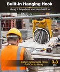 Cordless 20V Jobsite Fan With Infinite Speed, 180 Degree Tilt, Ring Light, USB C hanging with built-in hook at construction site.