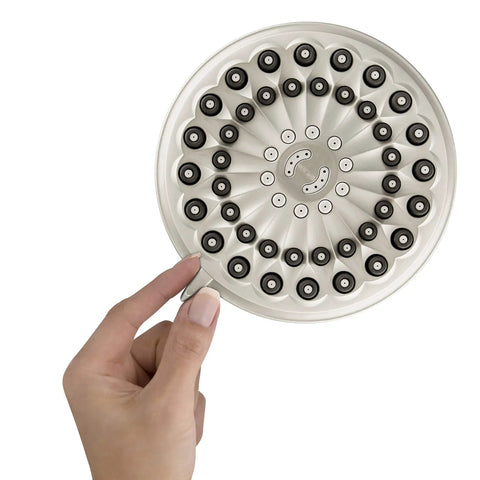 Hand holding Six-Mode RainFall Plus Rain Shower Head With PowerPulse Massage, Brushed Nickel Finish, showing spray nozzles.