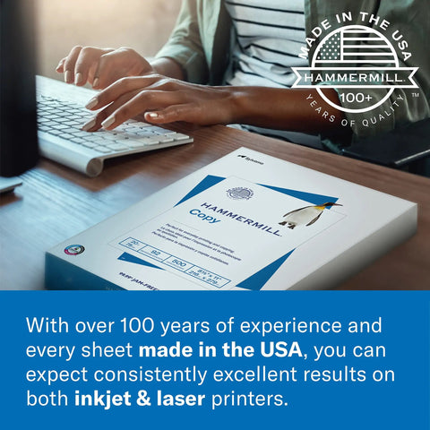 Person typing beside a ream of Premium Color Copy Paper 28 Pound 8.5 By 14 Copy Paper Ream 500 Sheets 100 Bright Ideal For Design Proposals Full Color Presentations Photos Brochures And More Made In The USA on a desk