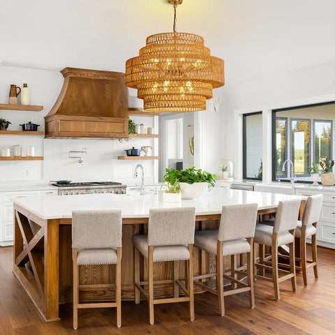 Epic Large Gold Boho Rattan Chandelier With 8 Lights hanging above a kitchen island, handwoven pendant light fixture