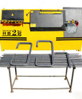 Top Shelf Cnc Rebar Stirrup Bending Machine Heavy Duty Steel Bar Bender Job Site Ready Smooth Operator with bent rebar on a metal table.