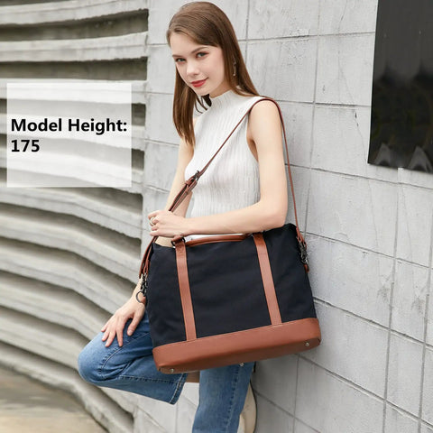 Woman holding Canvas Travel Tote Bag For Women With Zipper, Weekender Duffel And Carry On Tote, black and brown color