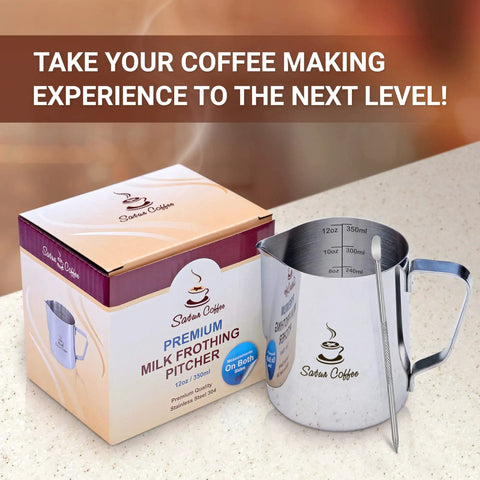 Stainless Steel Milk Frothing Pitcher 12oz 350ml With Dual Inside Measurement Scales For Precise Pouring And Latte Art Espresso Cappuccino Coffee Steaming Jug Plus Ebook Included next to product box on kitchen counter.