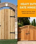 Heavy-duty gate hinges in use on wooden garden gates, showcasing 900 lb capacity gate hinge with built in ball bearings for smooth operation.