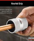 RIDGID pipe reamer with knurled silver body gripping copper tube