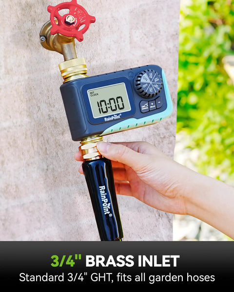 Person adjusting a Heavy Duty Metal Garden Hose Timer with Full Flow 100 Percent Metal Pipe on outdoor faucet for watering setup.