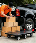 Heavy Duty Folding Platform Cart With Silent TPR Wheels, Straight Up Heavy Dolly For Moving And Garage Hauling, Hella Smooth Handcart Built For Daily Warehouse Grinds at work with cardboard boxes.
