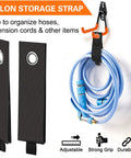 4 Pack Heavy Duty Garage Hooks, 7.7 Inch U Shaped Wall Mounted Hangers with 2 Extra Long Nylon Straps holding a coiled hose