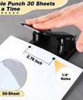 Heavy Duty Two Hole Punch Workhorse With 50 Prong Fasteners punching 30 sheets with 1/4 inch holes in an office setup.