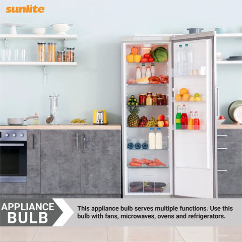 Appliance bulb in kitchen with open refrigerator, next to shelves and countertop, showcasing Incandescent A15 Appliance Bulb Pack.