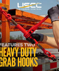 Hands using Heavy Duty Two Pack 5/16 Inch Grade 70 Ratchet Load Binders Workhorse Quality on flatbed trailer