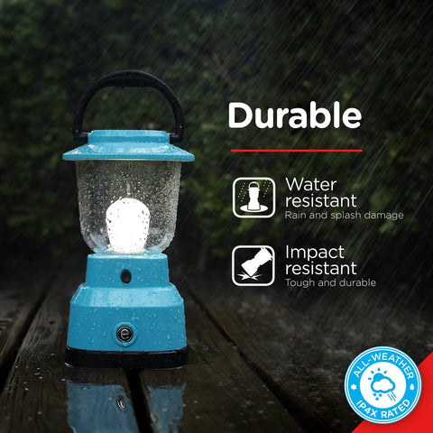 LED Camping Lantern With USB Charging, 800 Lumens Of Bright Light, Battery Powered And 200 Hour Run Time on wet wooden surface