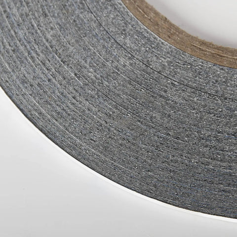 Close-up of Two And Three Millimeter Wide 50M LCD Repair Tape Adhesive for phone screens, showing texture and roll size.