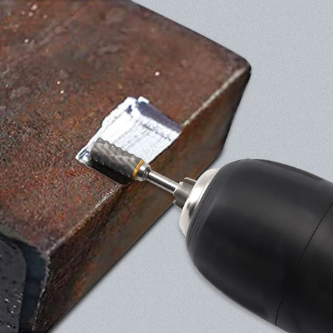 Hardcore Tungsten Carbide Rotary Burr in action on metal, 6mm cutting bit, showcasing precise detail and smooth finishes