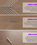 Ninoge 120Pcs stainless steel torsion springs assortment kit, 30 sizes, laid out on wood surface.