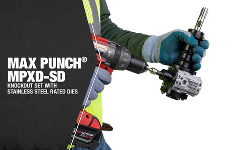 Worker holding cordless drill with Knockout Punch Driver Kit for Quick, Precise Hole Cuts, featuring removable draw studs.
