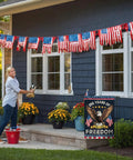 Patriotic Eagle Garden Flag For Outside Celebrating 250 Years Of Freedom 1776 To 2026 displayed near blue house with woman watering plants